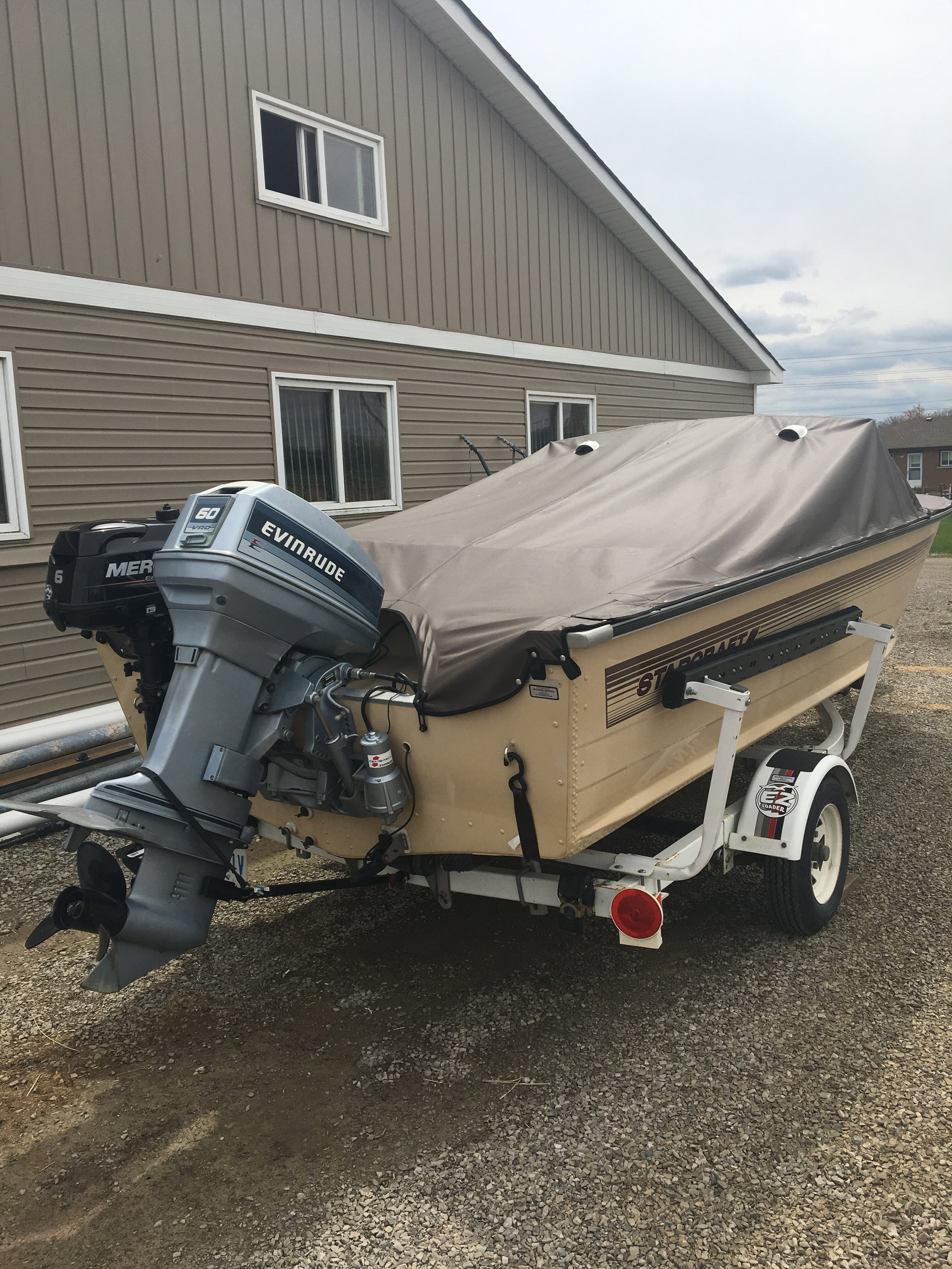 16' Starcraft fishing boat with Evinrude VRO 50 hp Outboard Motor